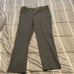 Nike dry fit golf pants. Excellent condition. Grey with black stripes. 36x32